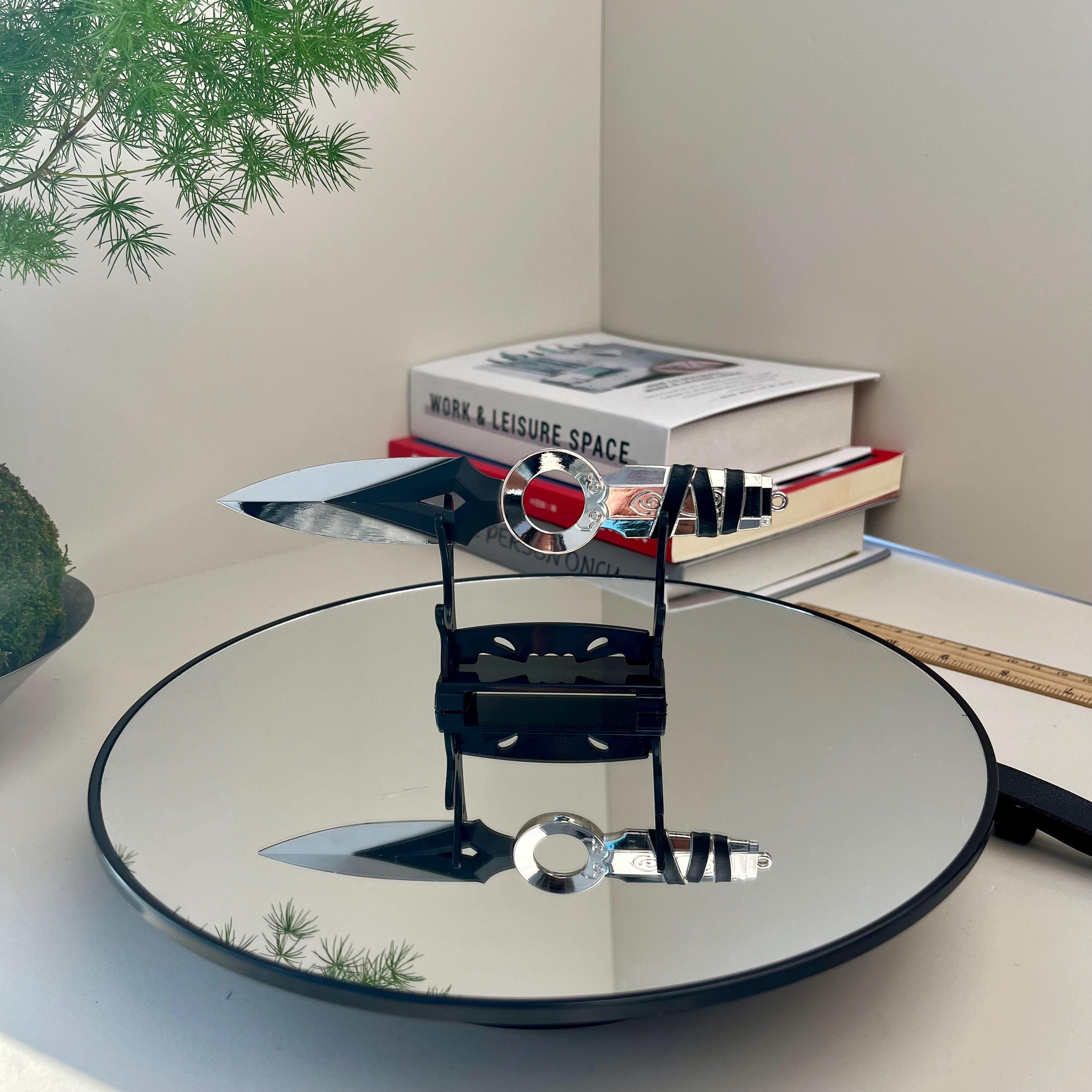 Valorant Jett Kunai Knife - Handcrafted metal, with scabbard, rotatable, a gamer's collectible.